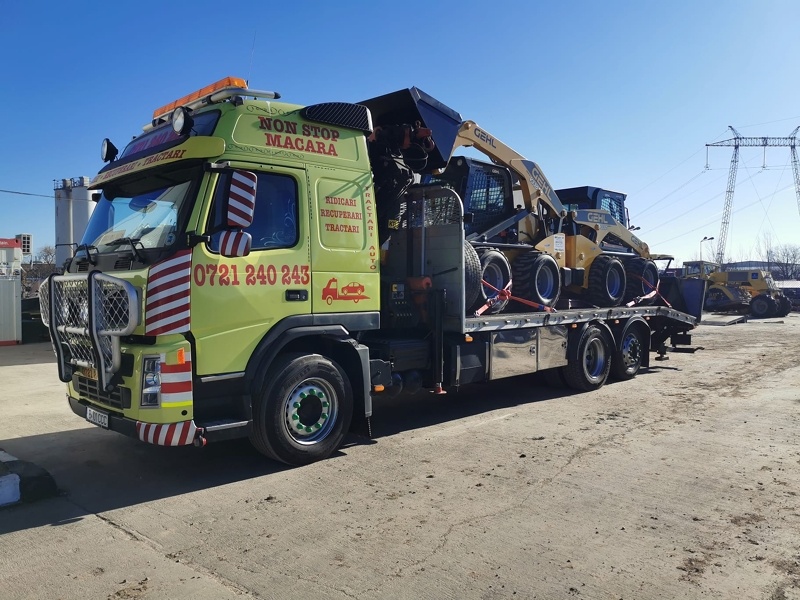 Transport buldozere, buldoexcavatoare, excavatoare